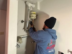 Professional Plumber in action